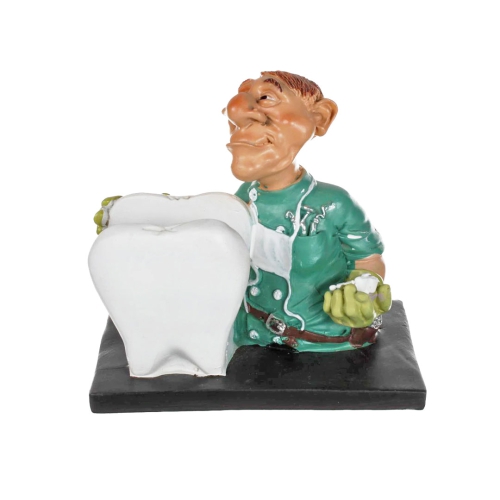 פסל קריקטורה “רופא שיניים”  עם מעמד כרט’ ביקור בצורת שן